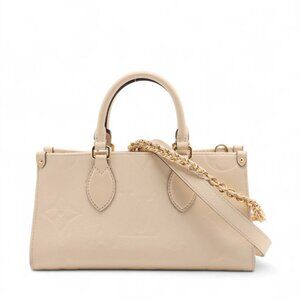 Louis Vuitton Monogram Empreinte OnTheGo East West Creme